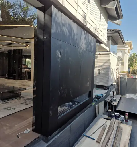 Black aluminum window frames refinished on a South Florida home